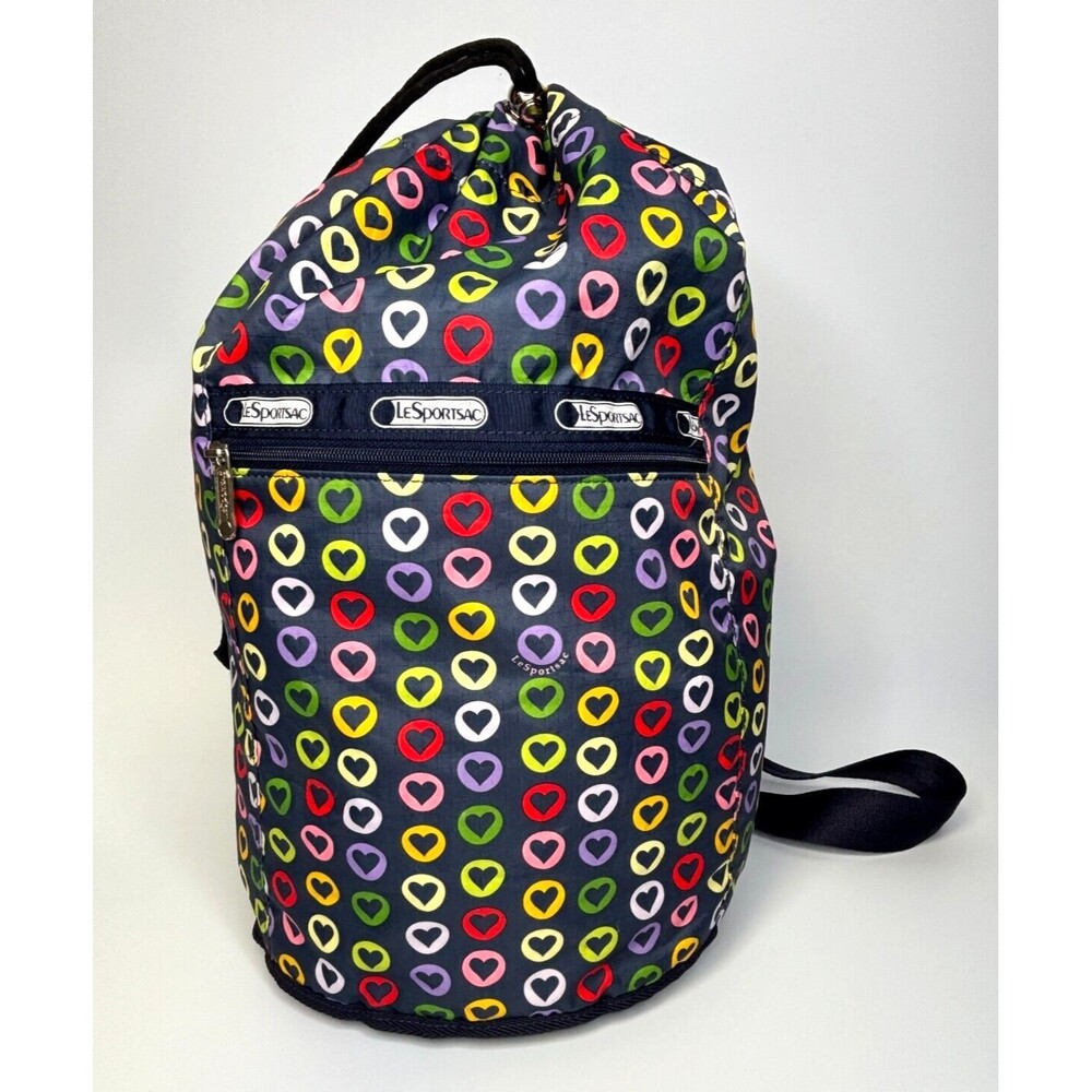 LeSportSac Sling Bucket Crossbody Bag Drawstring Top Reversible Hearts Navy EUC‎